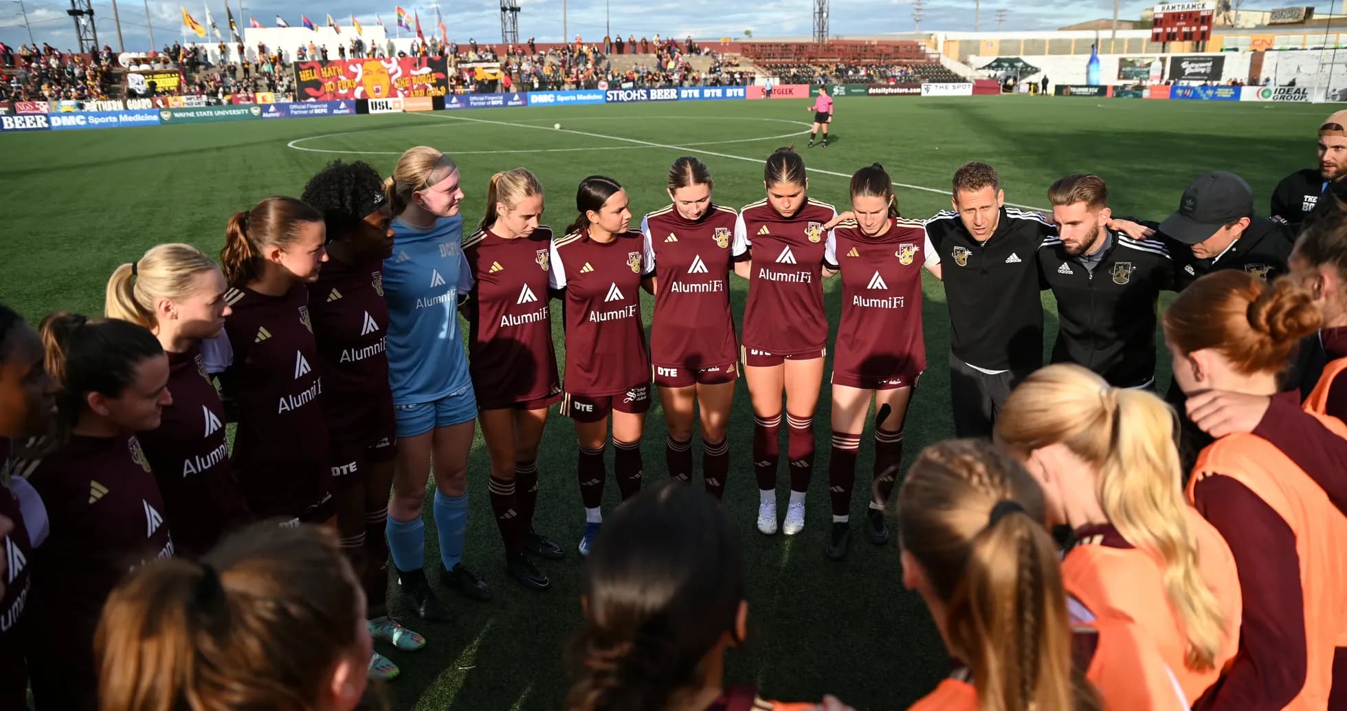 Detroit City players in team huddle before match