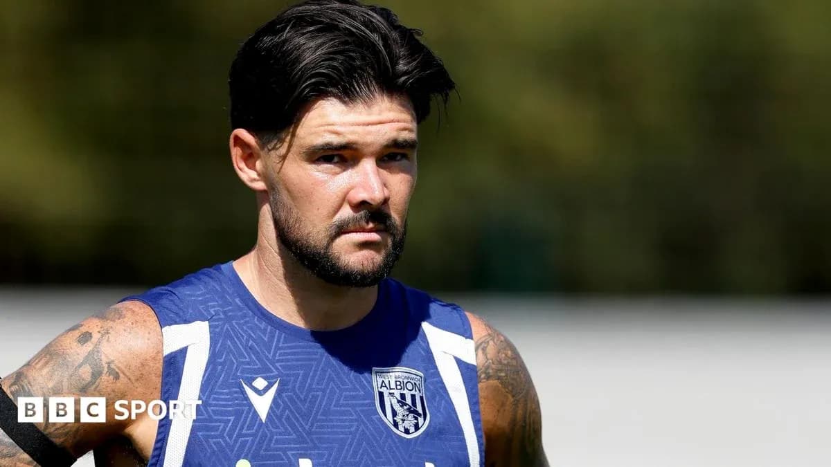 Football player training in West Bromwich Albion kit