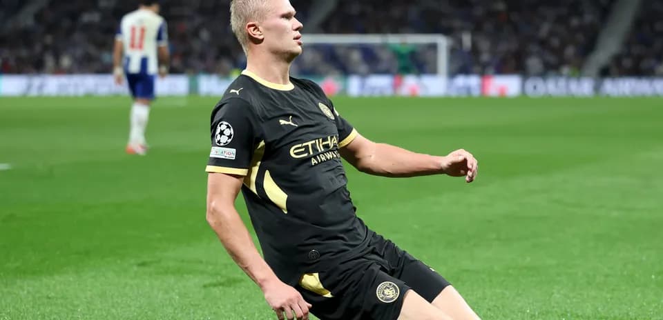 Player sliding on the pitch during a match