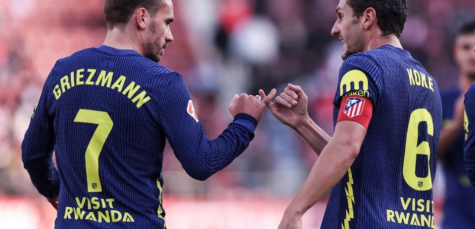 Griezmann and Koke celebrating during match