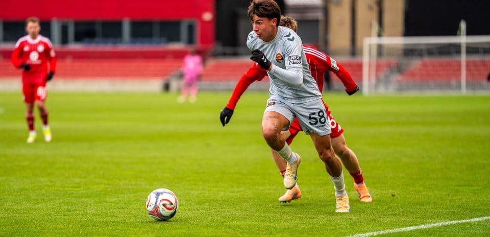Player chasing the ball during Chicago Fire II match