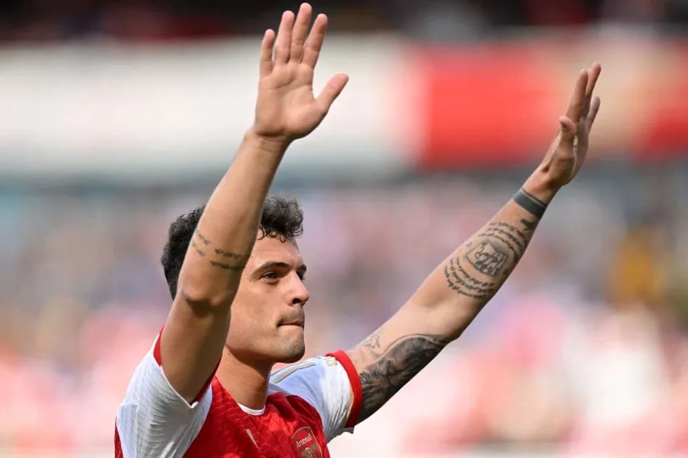 Player waving to fans after the match