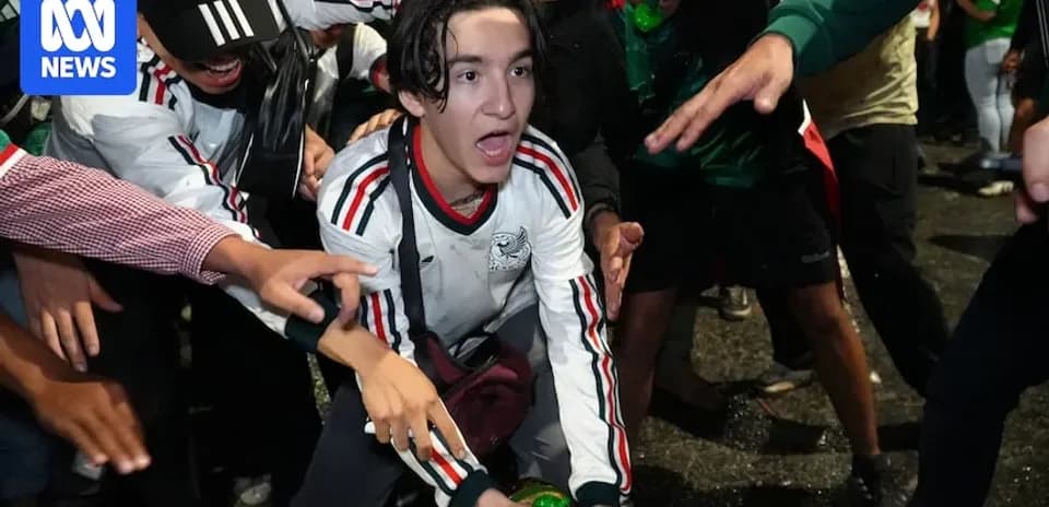 Fans celebrating with a soccer jersey during event