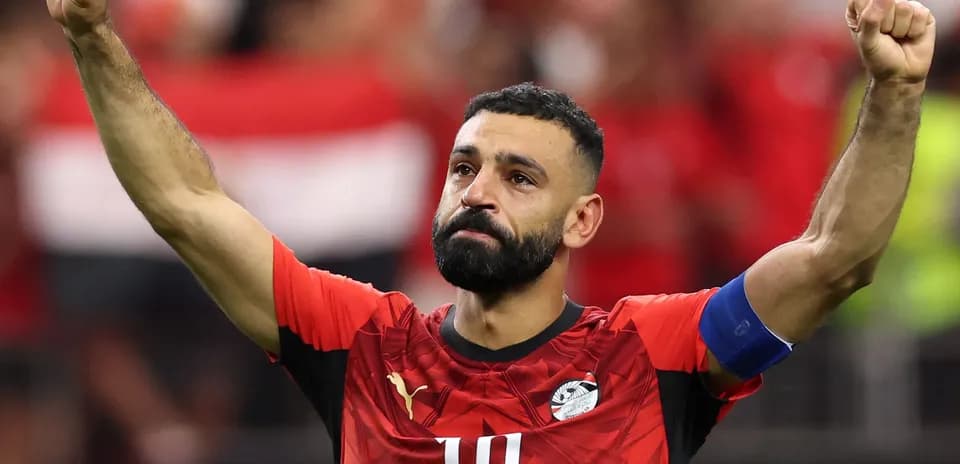 Player celebrating after a match, wearing Egypt jersey