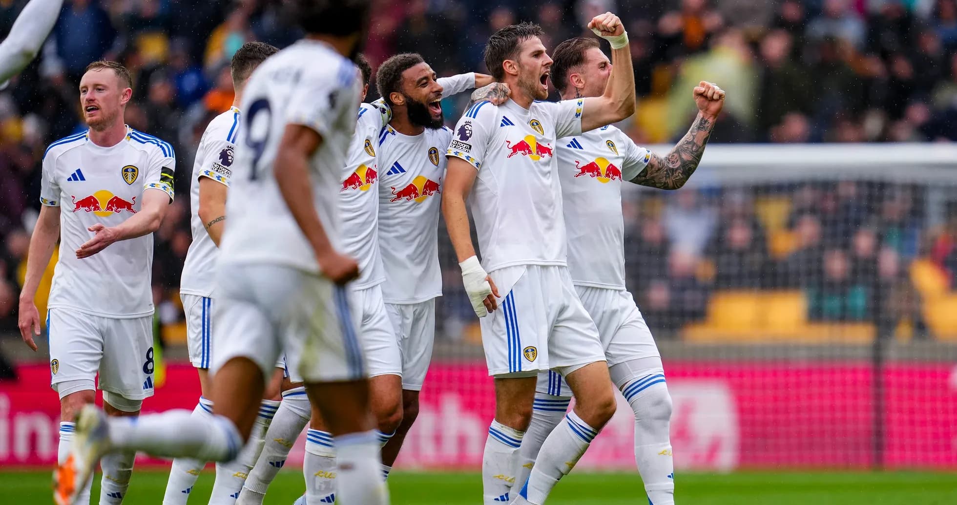 Leeds players celebrating a goal during match