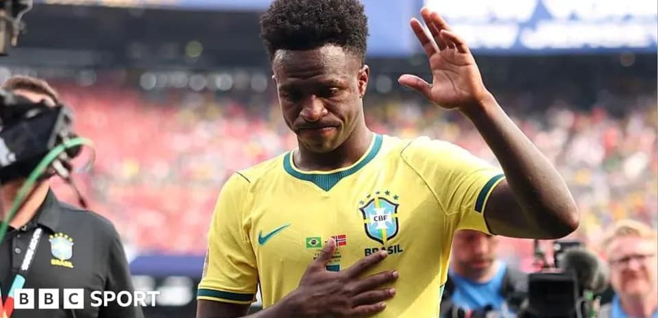 Player in Brazil jersey waving during match exit