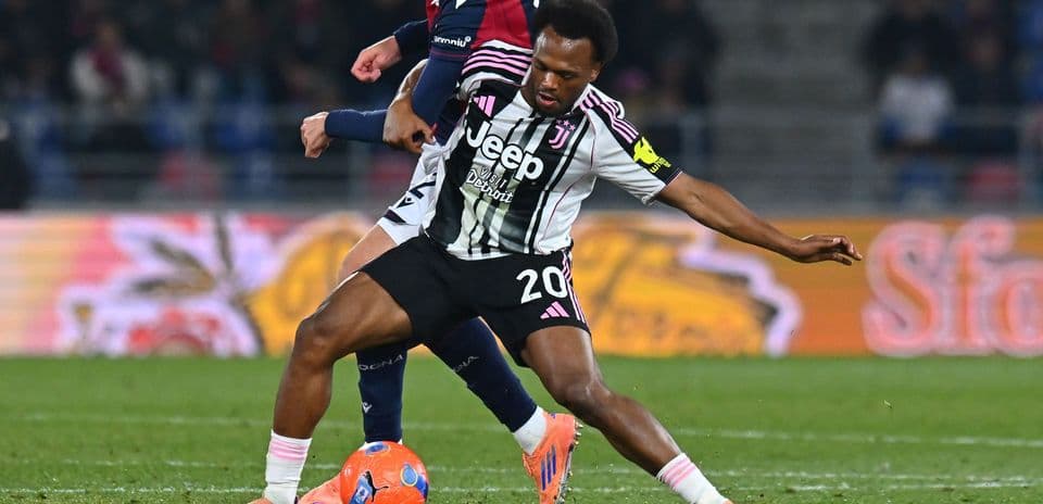 Juventus player tackling opponent during match