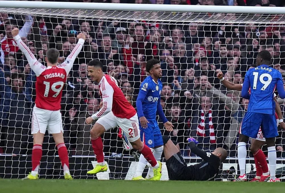 Arsenal players celebrating a goal against Chelsea