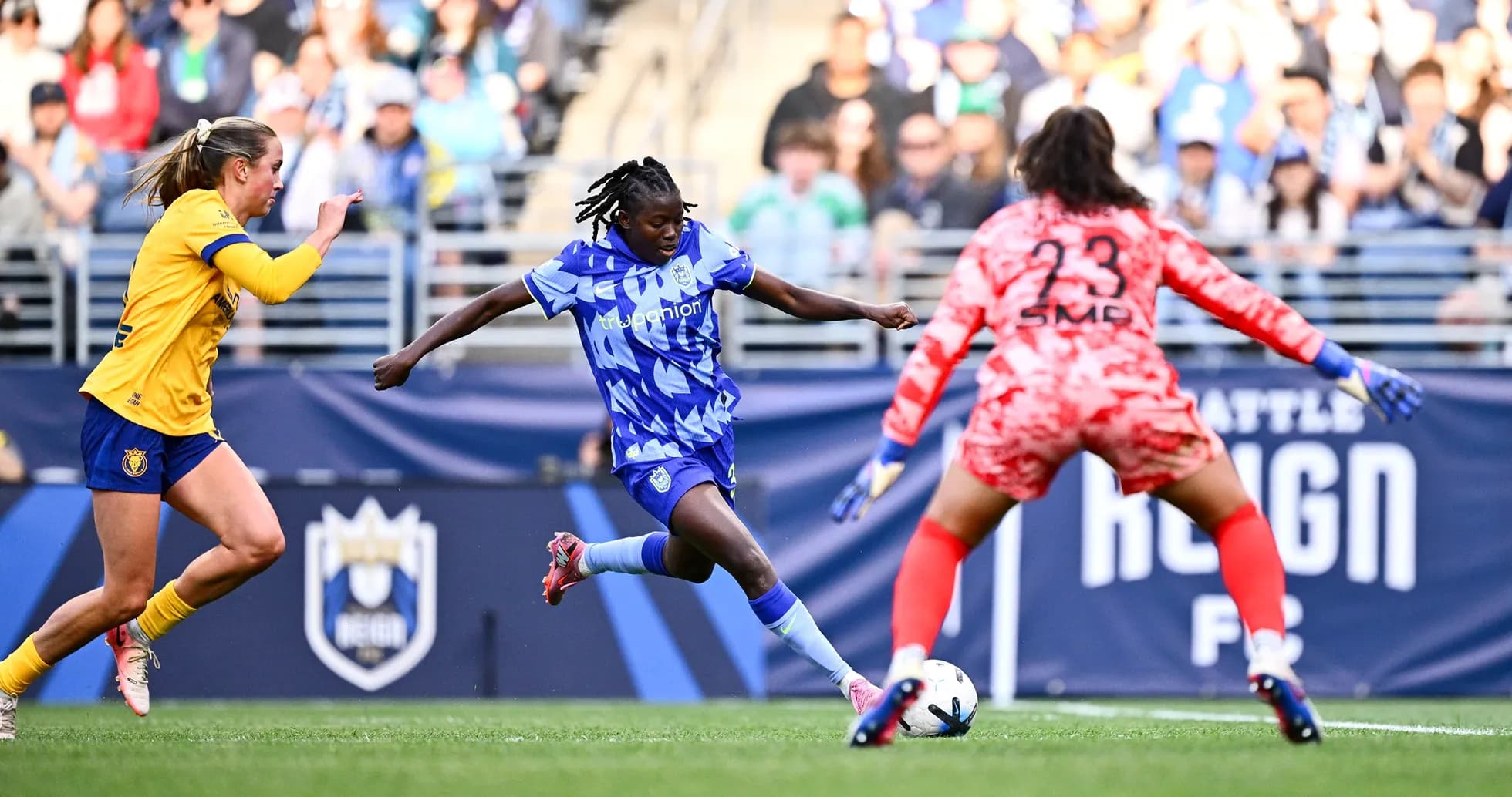 Seattle Reign FC player shooting on goal