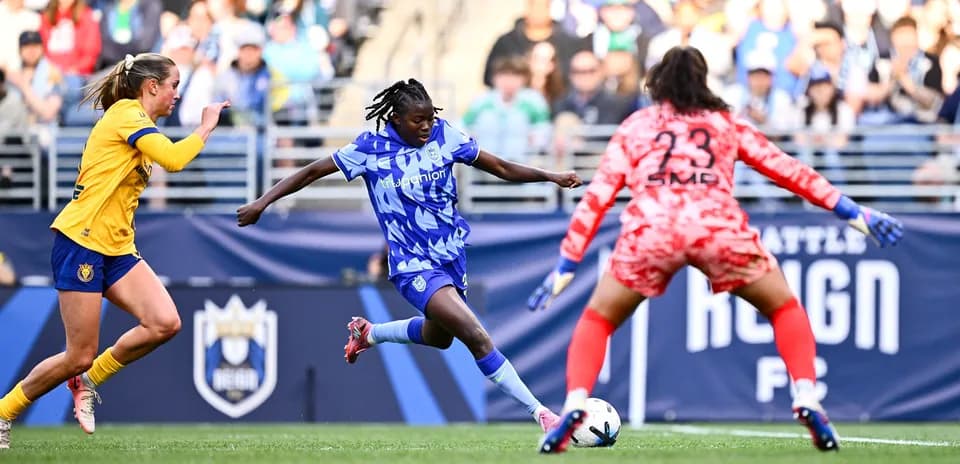 Seattle Reign FC player shooting on goal