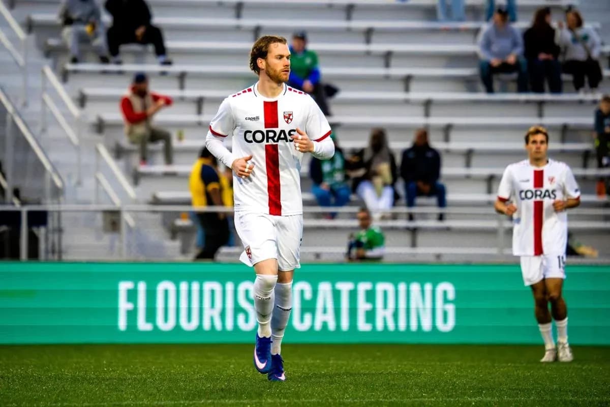 Loudoun United player running on the field