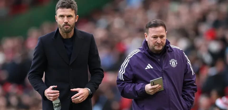Coaches walking on the sidelines during a match