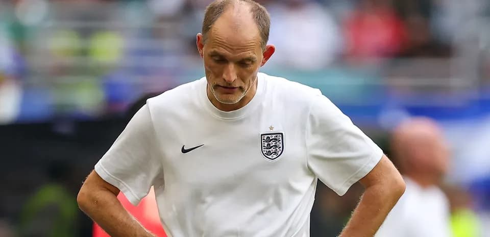 Coach looking down during match on field