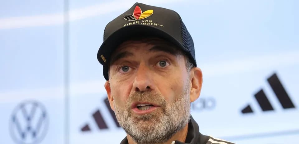 Manager speaking at press conference podium