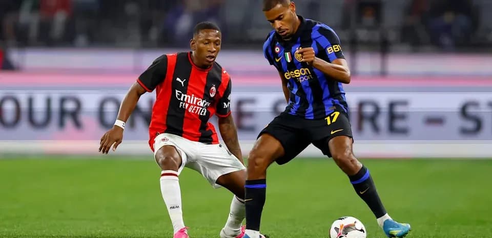 Two players contesting the ball during a match