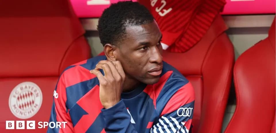 Player sitting on bench during a match