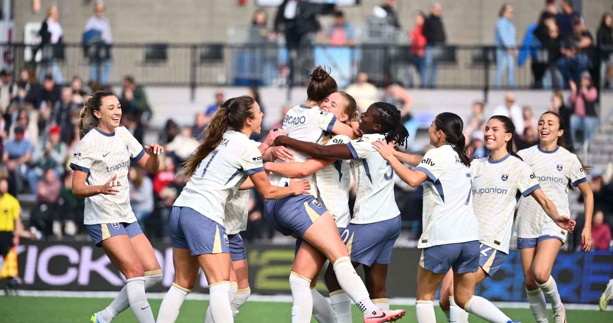 Seattle Reign FC players celebrating a goal