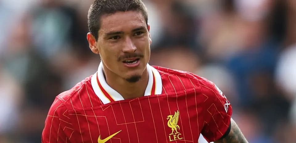 Player in Liverpool jersey during match action
