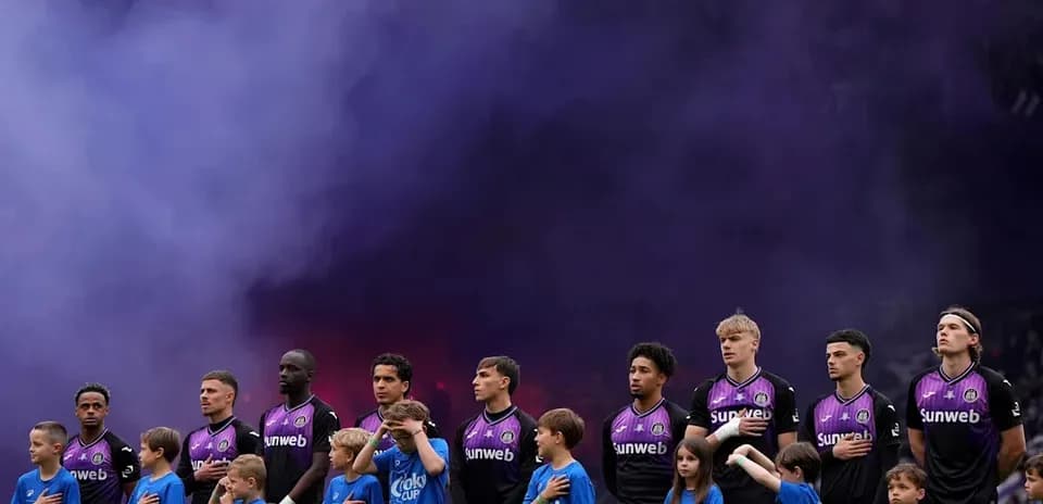Players and children lined up for national anthem