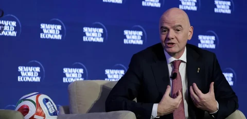 Gianni Infantino speaking at a seminar event