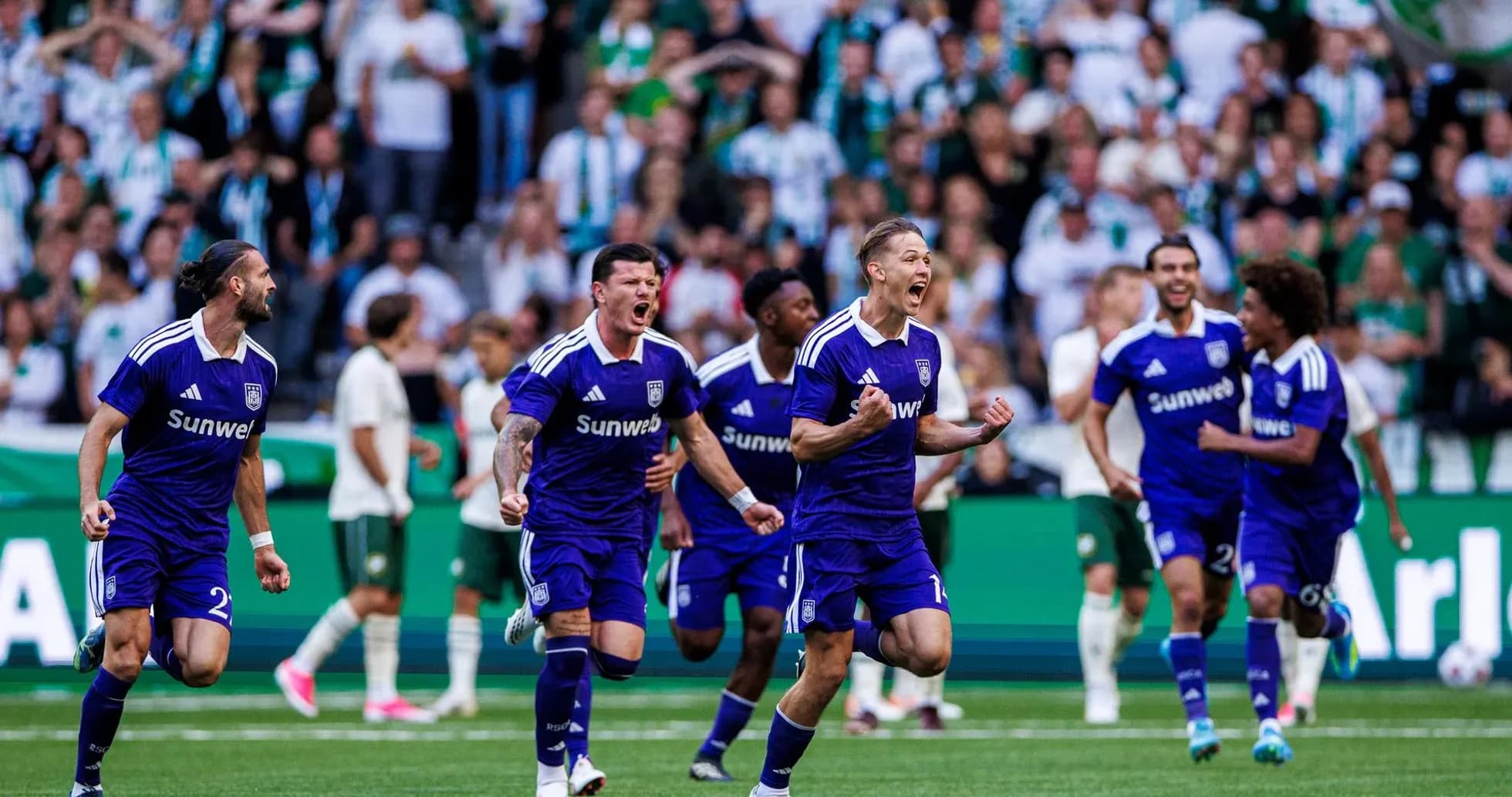Anderlecht players celebrating during a match