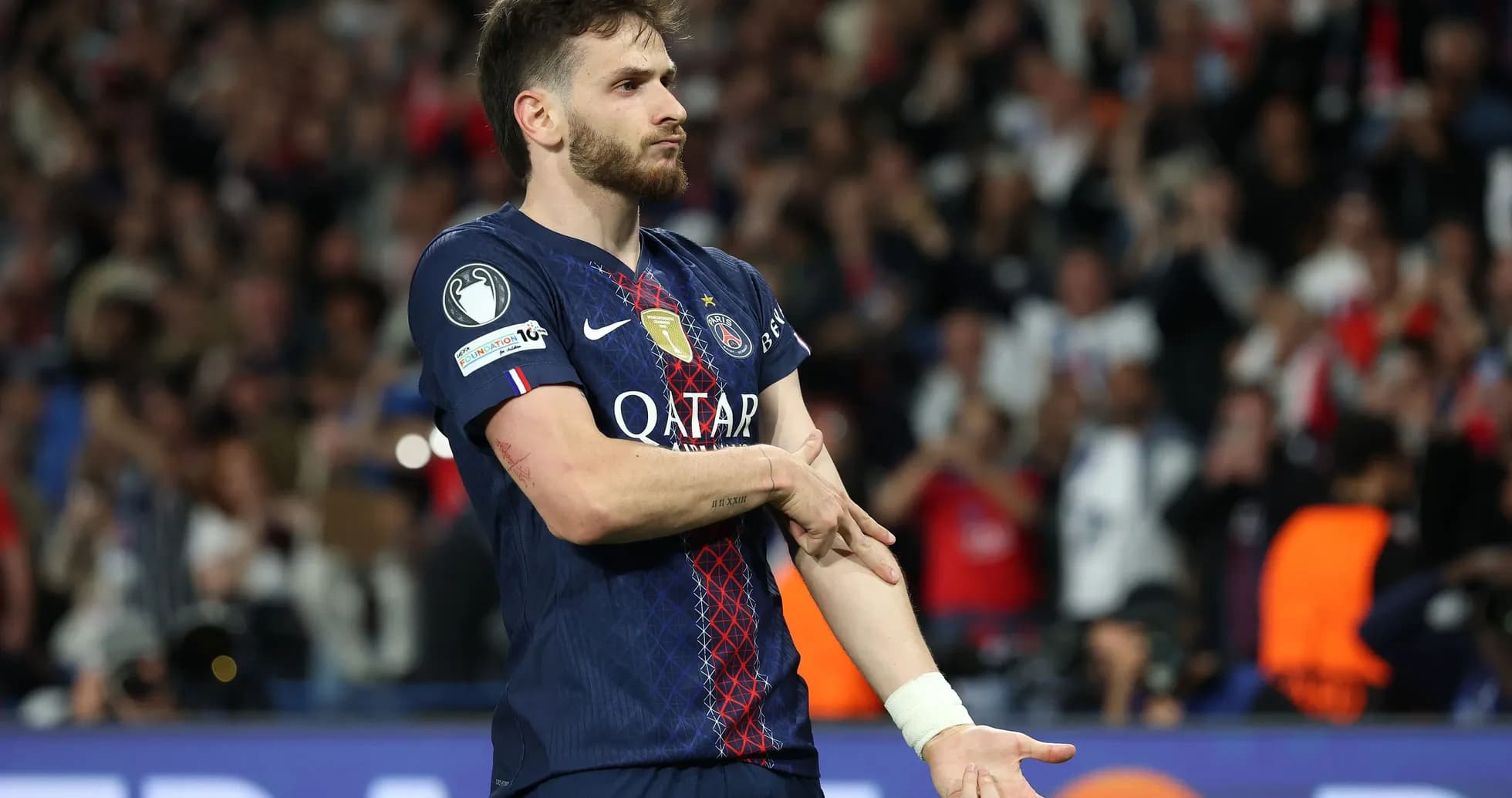 Player gesturing during match at stadium