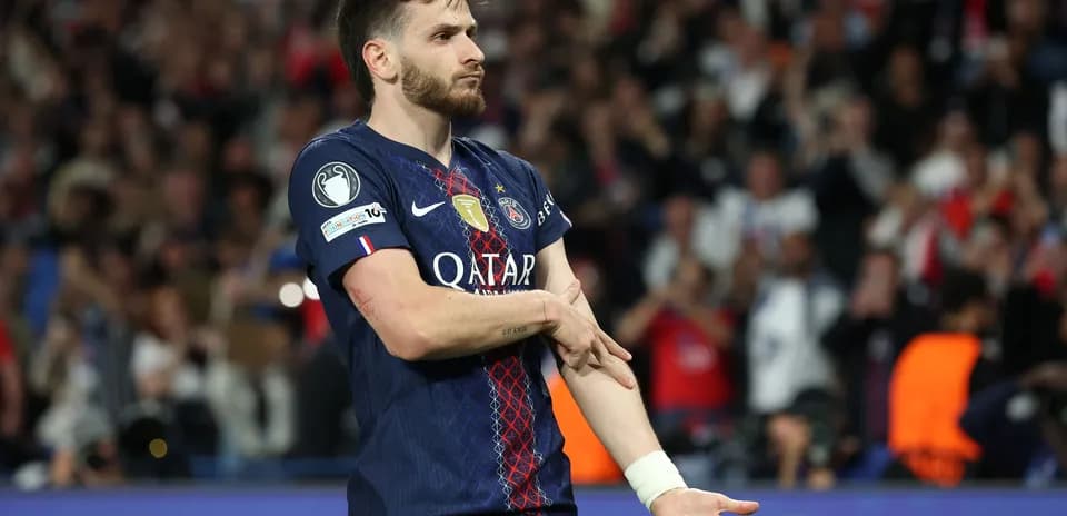 Player gesturing during match at stadium