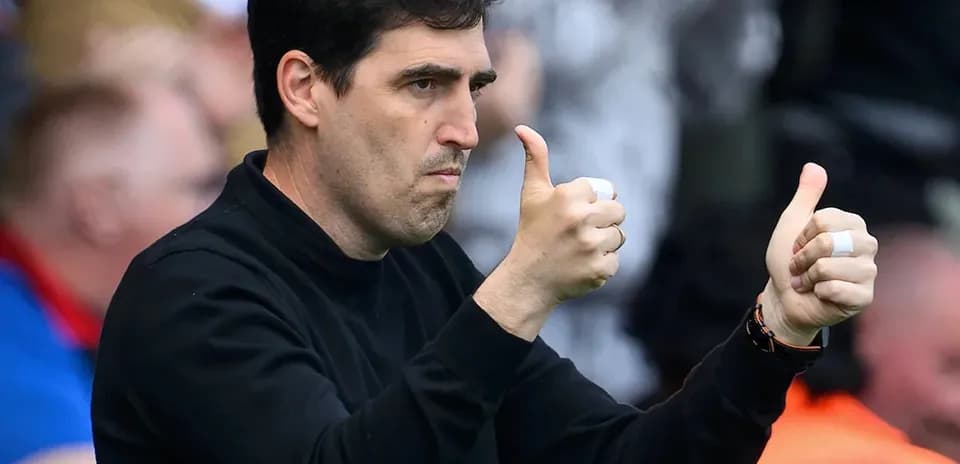 Coach giving thumbs up during a match