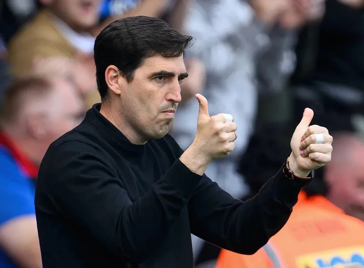 Coach giving thumbs up during a match