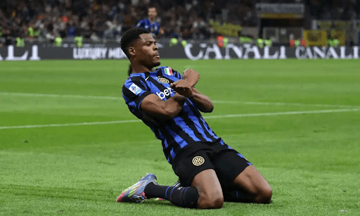 Player celebrating goal on the pitch