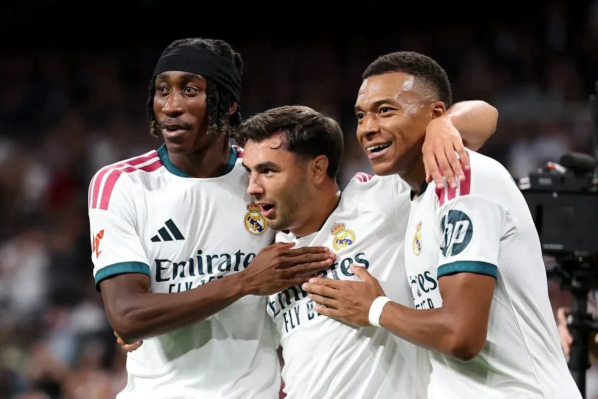 Real Madrid players celebrating a goal together