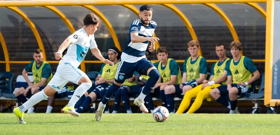 Crown Legacy player dribbling past Chattanooga opponent