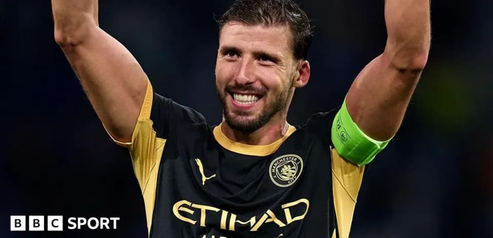 Player celebrating with arms raised after match