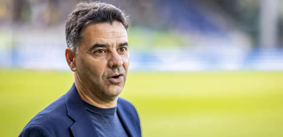 Coach speaking during match day preparations