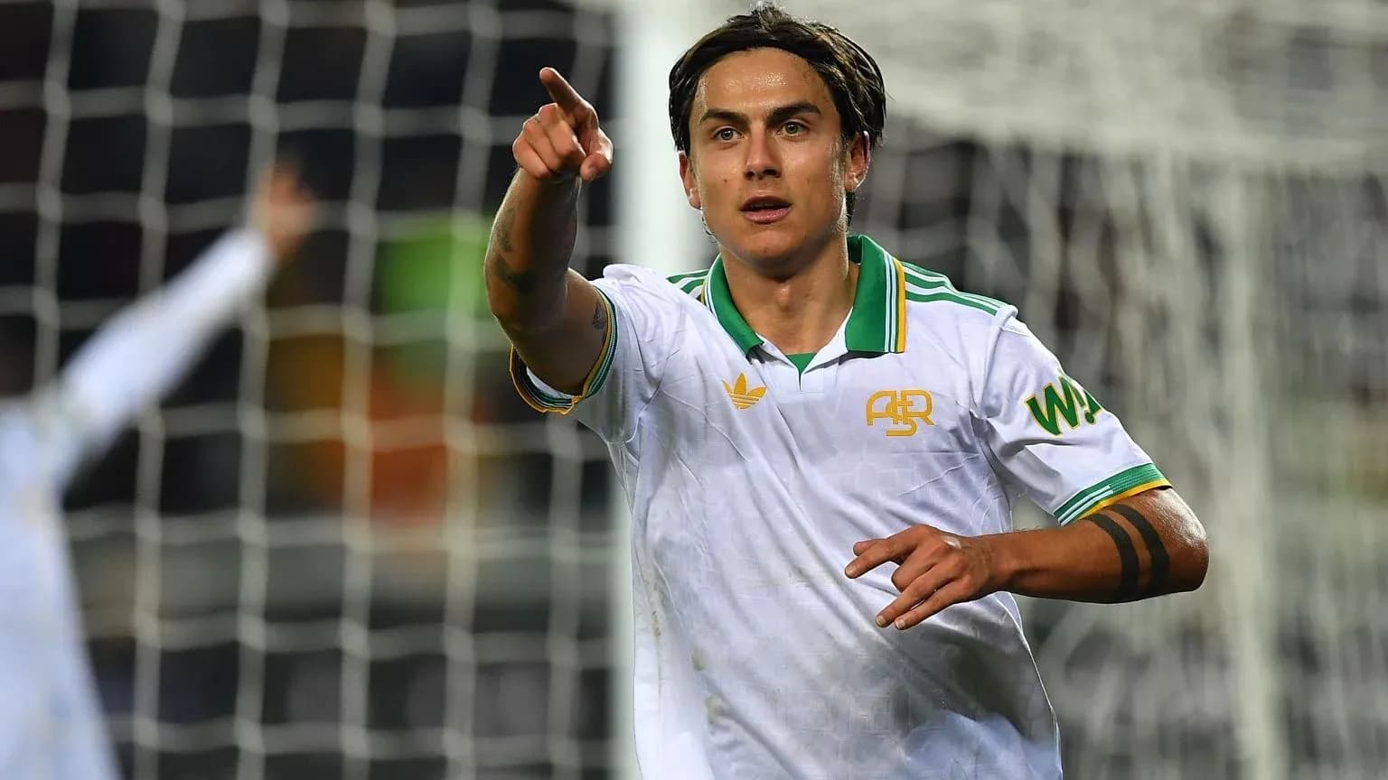 Player celebrating and pointing during a match