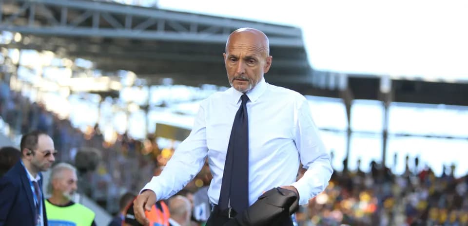 Coach walking on the sideline during match