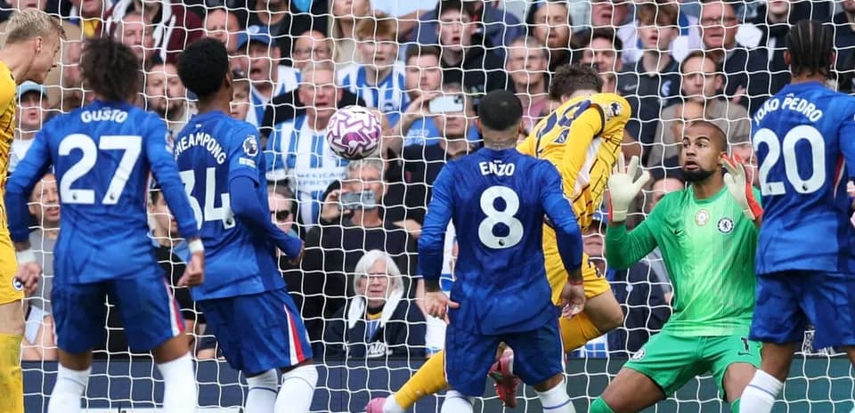 Players contesting a goal during Brighton vs Chelsea