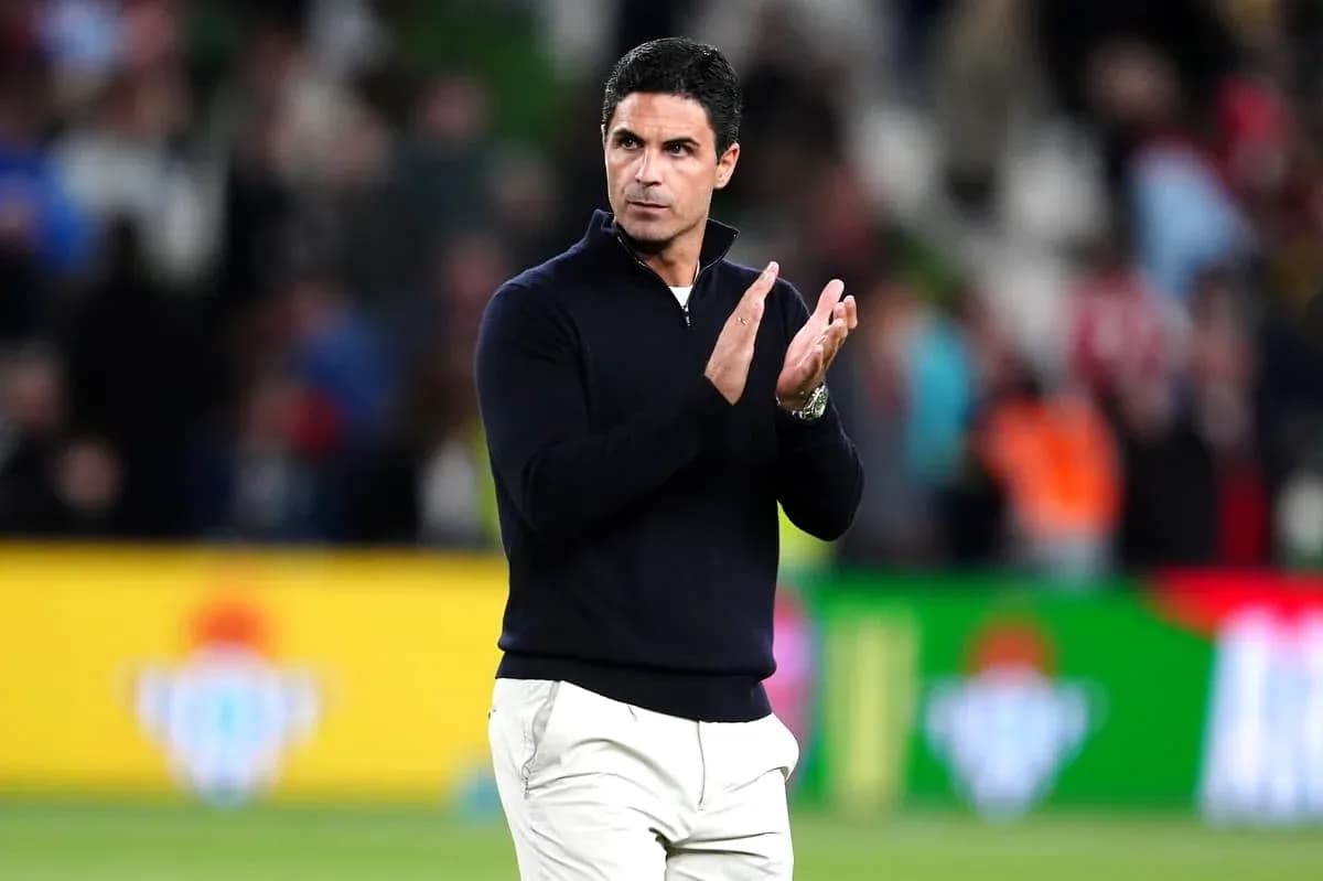 Coach applauding during a match on the sidelines
