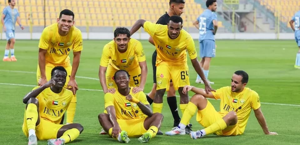 Ajman U23 players celebrating on the field