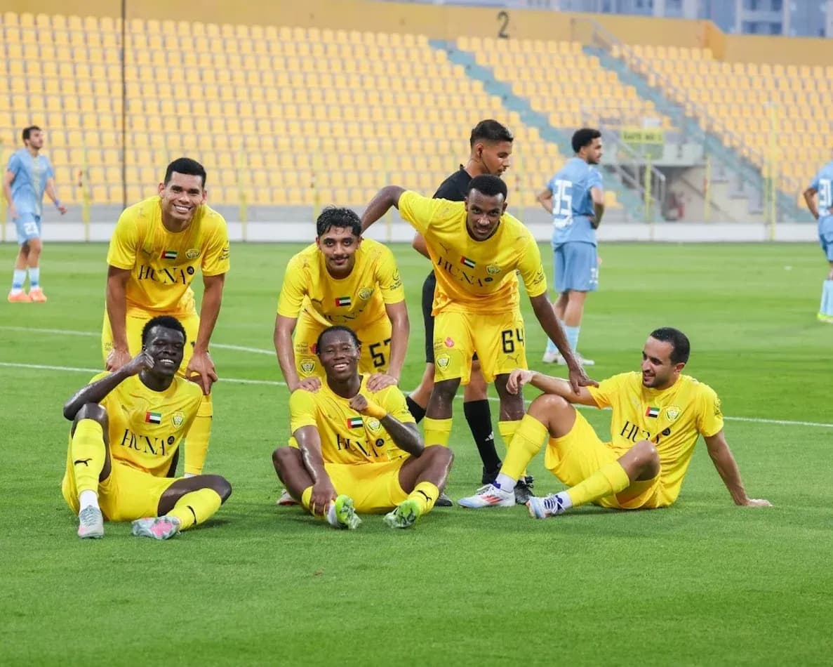 Ajman U23 players celebrating on the field