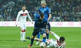 Player falling while competing for the ball during match