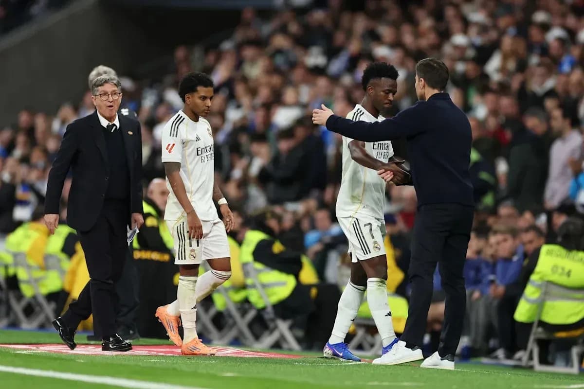 Real Madrid players substituting during a match