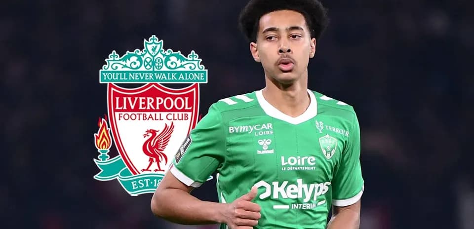 Player in green jersey with Liverpool logo background