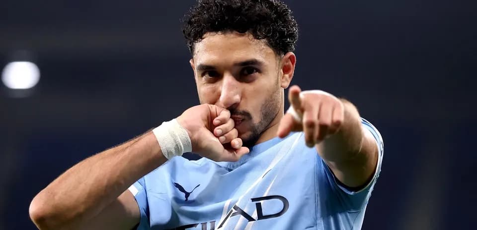 Player celebrating a goal with a gesture