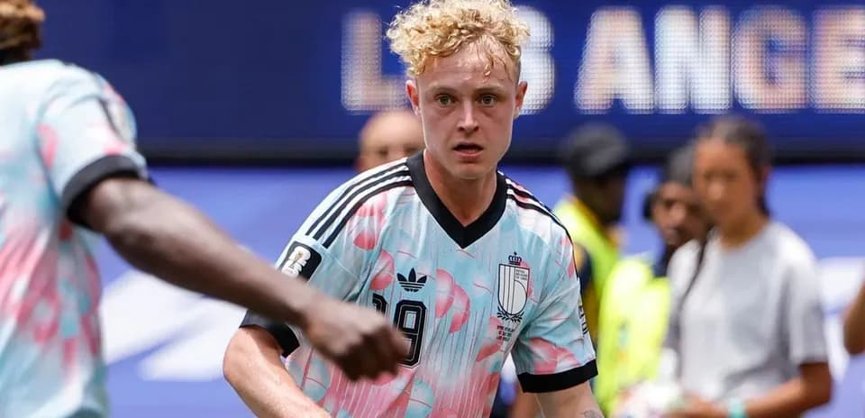 Player in colorful jersey during a soccer match