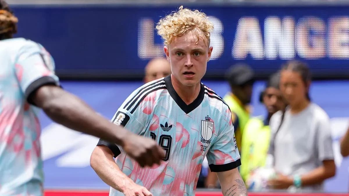 Player in colorful jersey during a soccer match
