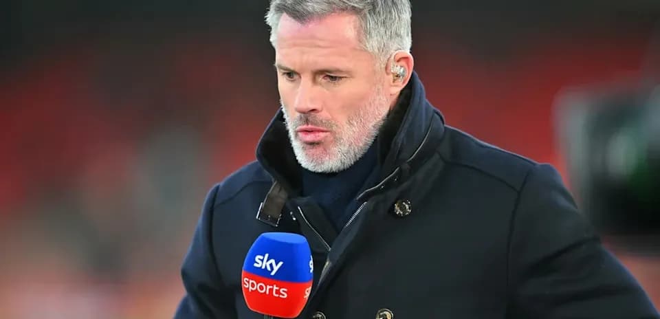 Sports analyst holding microphone before broadcast segment