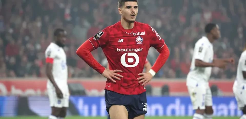Lille player looking concerned during match action