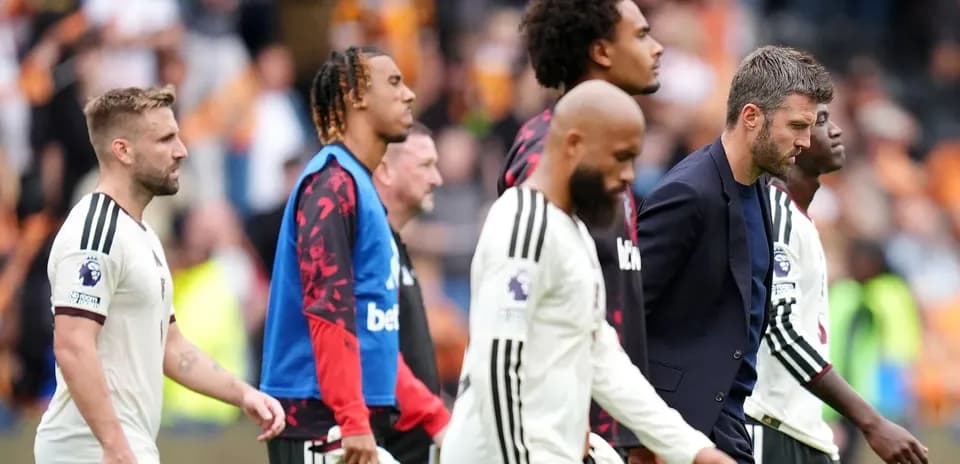 Players walking off the pitch after the match