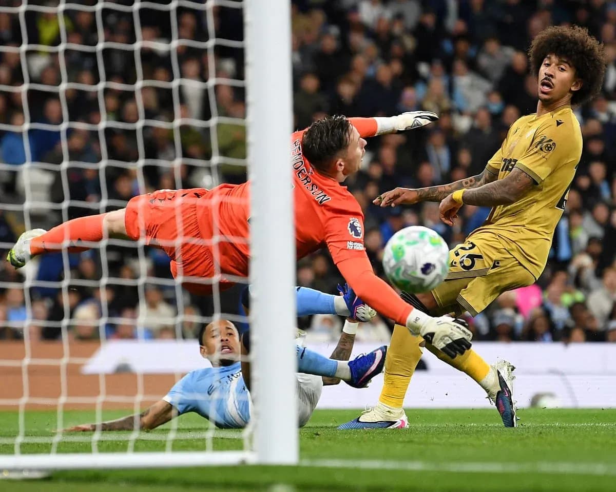 Goalkeeper diving to save during Crystal Palace match